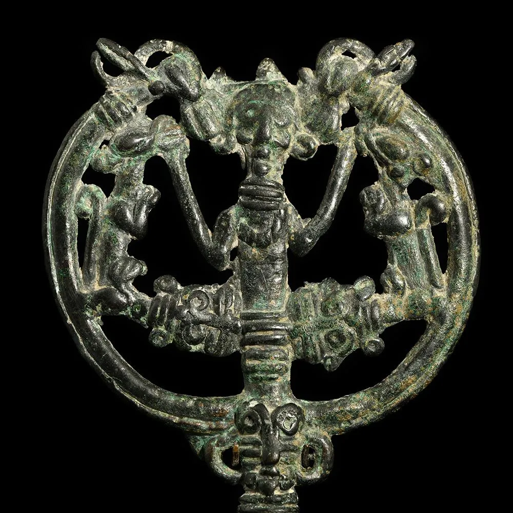 A Luristan Bronze Openwork Pinhead, ca. early first millennium BCE