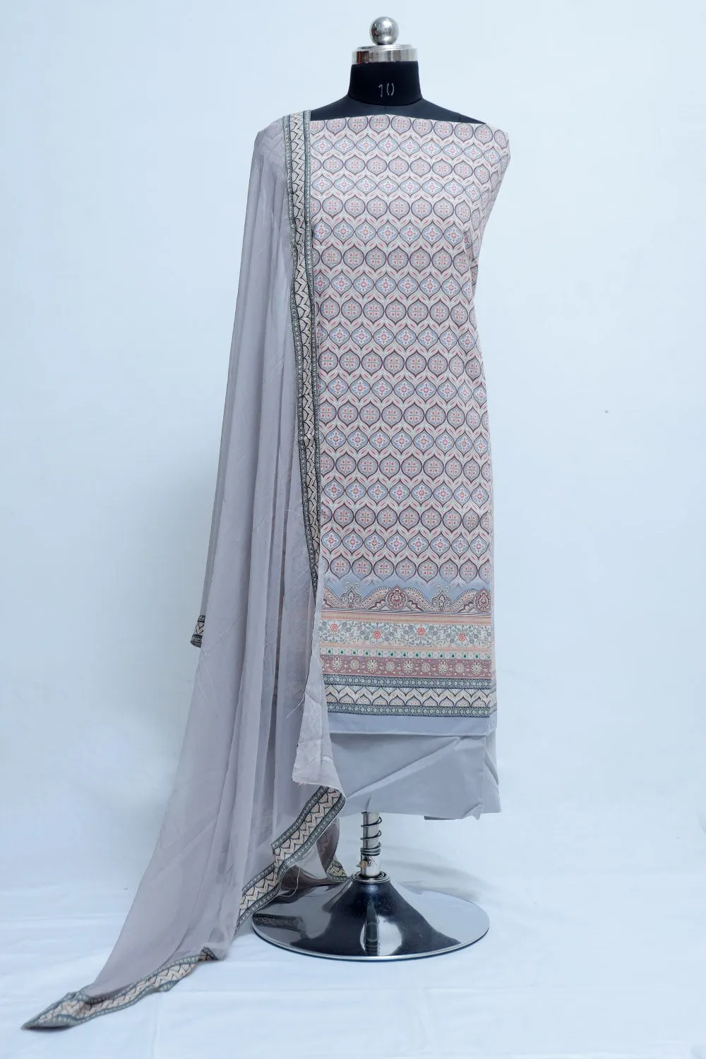 Classy Ash Grey Colour Beautifully Printed Suit  Known For Its Unique Design & Enhances The Personality Of Wearer.